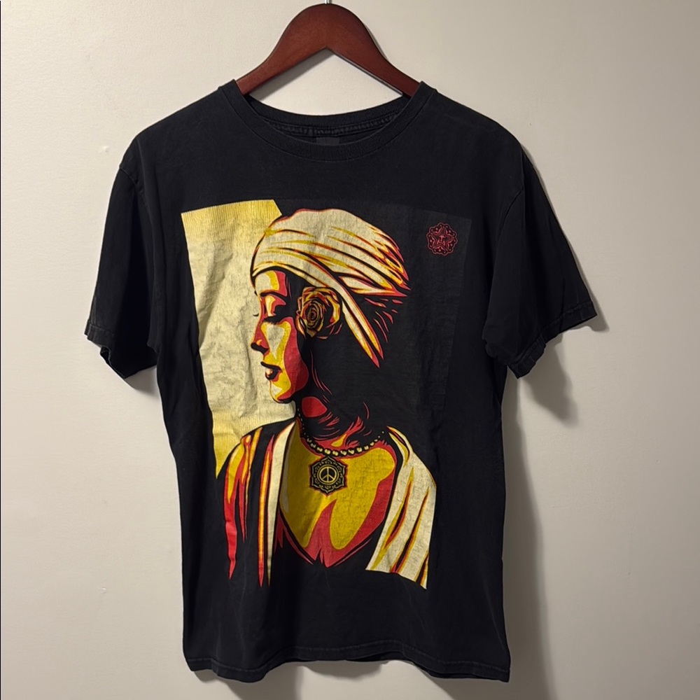 Obey Black Short Sleeve Graphic Tee with Yellow & Red Portrait